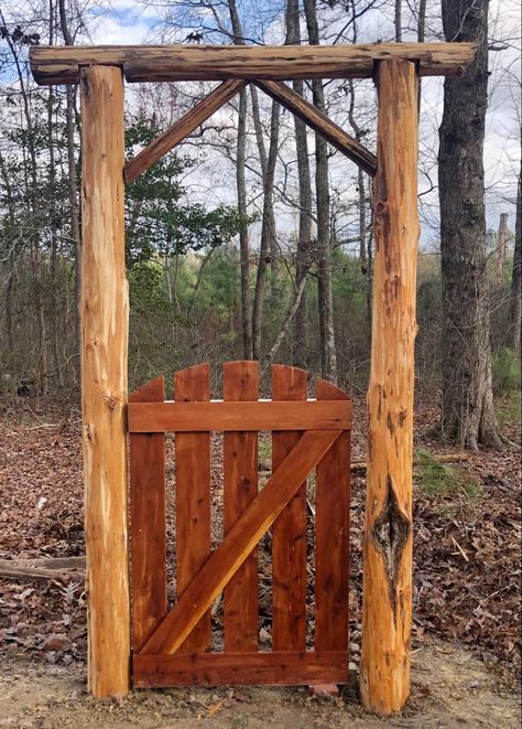 I made this for a client in Chapel Hill, NC. The gate is made with local eastern red cedar and the logs are also eastern red cedar that were peeled using a old log peeler. Wooden Gates Ideas, Cedar Garden Gate, Log Fence Rustic, Arched Wooden Gate, Property Gates Wood, Log Entrance Gate, Landscaping Deck, Floating Decks, Log Fence