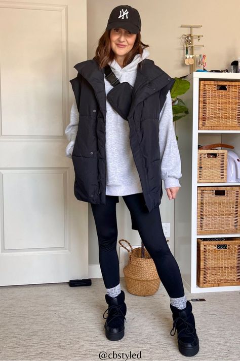 Puffer Vest Winter Outfit, Oversize Puffer Vest, Style With Puffer, Leggings And Hoodie Outfit Winter, Fashionable Walking Outfit, Long Black Puffy Vest Outfit, Style With Puffer Vest, Puffer Vest And Scarf Outfit, Oversize Vest Outfits For Women