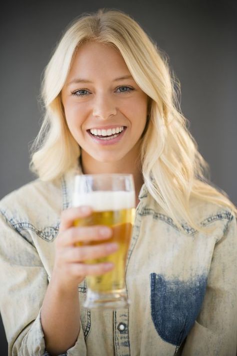 virtual happy hour ideas -  Portrait of young woman holding glass of beer, Jersey City, New Jersey, USA Happy Hour Ideas, Wine And Paint Night, Glass Of Beer, Fun Conversation Starters, Pint Of Beer, Youtube Makeup, Drink Beer, Friends Laughing, Comfy Dresses