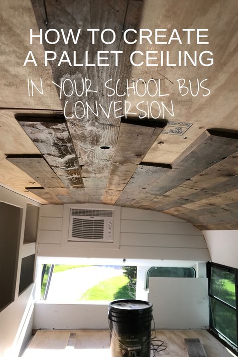 Using pallet boards as our skoolie ceiling turned out to be fairly on the cheap side, compared to what it could have been if we used tongue and groove or cedar! And we love how they turned out!   #skoolieceiling #palletceiling #shiplap Bus Ceiling Ideas, Skoolie Ceiling Ideas, Skoolie Ceiling, Pallett Wall, Minibus Conversion, Skoolie Design, Camper Flip, Skoolie Living, Bus Renovation