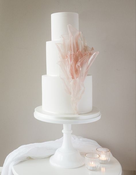 White wedding cake with pink rice paper sails, by Wren Cake Design #weddingcakedesigns #blushwedding #ricepaper #pinkweddingcake Watercolor Cake Tutorial, Modern Blush Wedding, Rice Paper Sails, Blush Wedding Cake, Contemporary Cake, Wedding Cake With Pink, Textured Wedding Cakes, Yellow Wedding Cake, Unusual Wedding Cakes