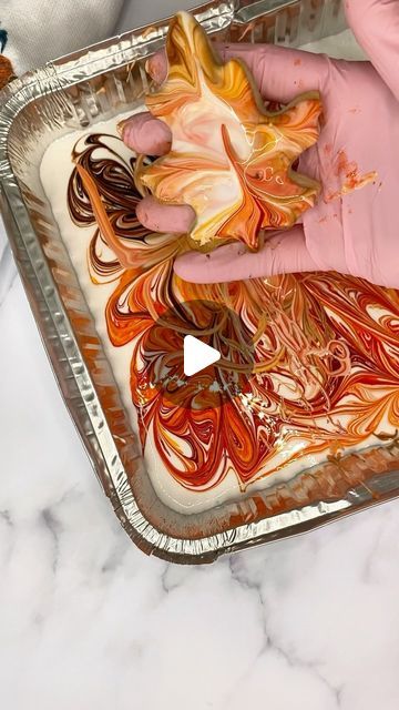 Sweet Sisters on Instagram: "The leaves are slowly starting to change! 😍  Each morning is a new beauty to see 🍁 

In honor of such, here is a quick and fun way to make some marbled fall leaf cookies! I poured my medium-flood consistency royal icing into an aluminum pan , added multiple food coloring , swirled and dipped 🍁 
Fun for kids too! 
.
.
.
#fall #fallleaves #fallcookies #fallfoilage #leafcoookies #cookies #cookiedecorating #cookietips #royalicing #fallbaking #bake" How To Make Brown Color Icing, Swirl Royal Icing Cookies, Royal Icing Fall Leaves, Maple Royal Icing, Fall Leave Cookies, Leaf Cookies Fall, Cutout Cookies Frosting, Fall Leaf Cookies Decorated, Leaf Cookies Royal Icing