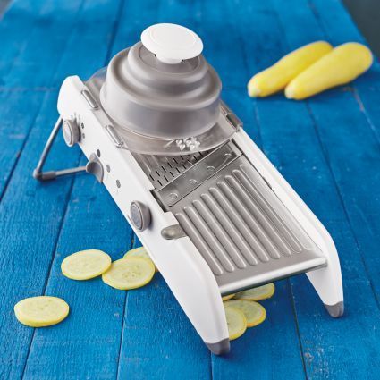 Progressive PL8 Professional Mandoline Slice, julienne, waffle-cut and more with this professional-grade mandoline. A quick, easy way to prep veggies and fruit, mandoline features four slicing thicknesses, a durable stainless steel slicing deck and a stable, nonslip base that keeps the mandoline from sliding during use.   Thanks to integrated, multi-function blades and handy controls, changing from julienning to slicing or adjusting slice thickness is as simple as turning a knob. Affiliate  Link Cucumber Tea Sandwiches, Julienned Carrots, Box Grater, Mandolin Slicer, Cut Resistant Gloves, Think Geek, Kitchen Must Haves, Hot Chocolate Mug, Rugs Kitchen