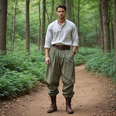 These medieval pants for men are olive green, loose, and gathered from the ankles to enhance comfort in historical authenticity. These loose trousers are perfect for looking aesthetically pleasing at LARP events or Renaissance fairs and historical reenactments that span both the Viking and Renaissance periods. Looseness in the trousers and gathered ankles make it comfortable to walk in while their rich color brings in a rugged touch to the elegance of olive. Crafted from strong material, these p Medieval Casual Clothes, Male Larp Costume, Bg3 Camp Clothes, Viking Fashion Men, Victorian Man Clothes, Ren Fair Men Outfits, Hobbitcore Outfits Men, Medieval Clothing Men Noble, Flowy Clothes Men