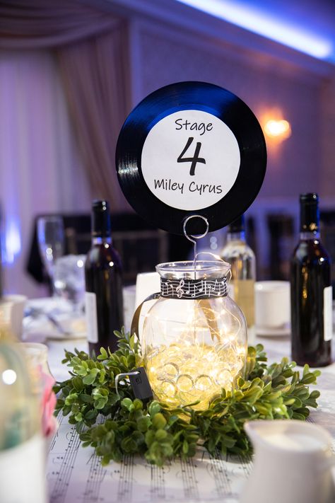 Table decor at Tomasello Winery wedding 90s Table Decor, Album Centerpieces, Music Wedding Centerpieces, Record Centerpieces Ideas, 70s Centerpiece Ideas, Glastonbury Party, Music Centerpieces Ideas, Record Centerpiece, 80s Wedding Theme