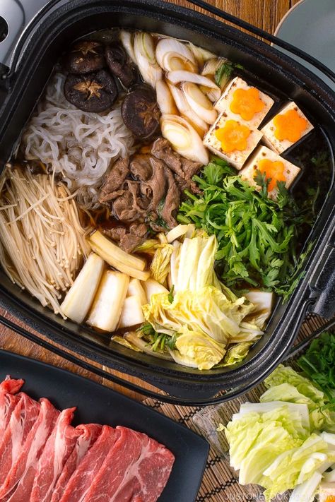 Cozy up at your get-together with friends and family with this homemade Japanese Sukiyaki recipe, served with seared marbled beef and a variety of vegetables cooked in a soy sauce broth. #sukiyaki #hotpot | Easy Japanese Recipes at JustOneCookbook.com Japanese Sukiyaki Recipe, Japanese Sukiyaki, Sukiyaki Recipe, Hot Pot Recipe, Just One Cookbook, Easy Japanese Recipes, Tofu Dishes, Japanese Recipes, Soups Stews