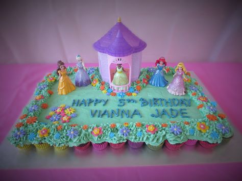 Disney Princess Birthday Cake - pull apart cupcakes cake / Easy Disney Princess Birthday Cake / Cake decorated by toys / Flower Garden Cake Number 3 Princess Cake, Disney Princess Cupcake Cake, Princess Pull Apart Cupcakes, Disney Princess Cake Ideas Buttercream, Princess Cupcake Cake Pull Apart, Disney Princess Birthday Cake One Tier, Princess Cupcake Cake, Disney Princess Cake Rectangle, Cupcakes Princesas