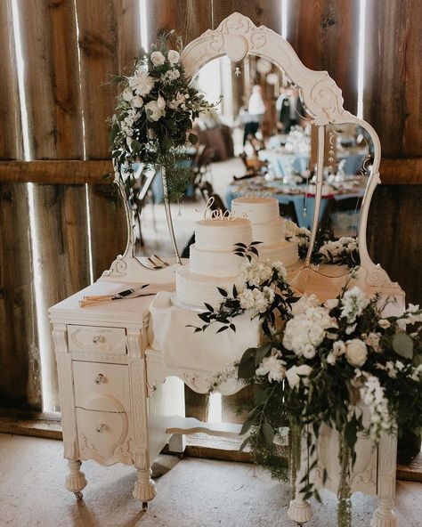 Broad View Events on Instagram: “So in love with our cake display from M & J’s wedding. Vintage vanity, the brides bouquet repurposed, and a showstopping cake! . . Photo…” Wedding Cake Backdrop, Vintage Wedding Backdrop, Vintage Furniture Wedding, Vintage Wedding Cake Table, Grooms Cake Tables, Wedding Ceiling Decorations, Wedding Business Ideas, Cake Backdrops, Wedding Cake Display