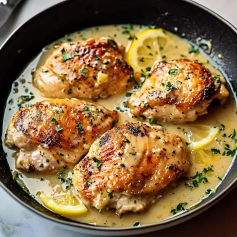 Delicious Baked Lemon Butter Chicken Recipe Bake Lemon Chicken In Oven, Butter Lemon Chicken Recipe, Chicken Lemon Butter Sauce, Lemon Chicken Thighs Baked, Lemon Chicken Thigh Recipe, Lemon Chicken Recipe Baked, Lemon Butter Garlic Chicken, Lemon Chicken Bake, Baked Lemon Chicken Thighs