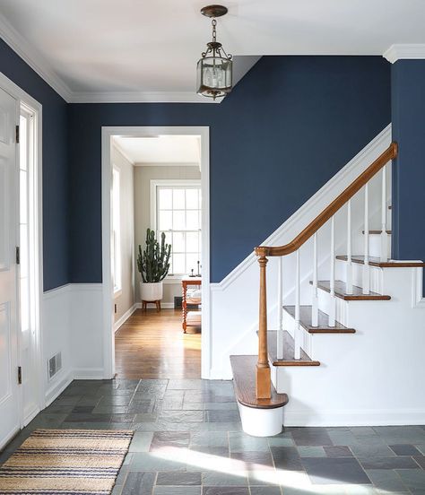 Love the navy walls over white with chair rail - the mix of white keeps it from getting too dark in a small area like a foyer!!! Farrow And Ball Stiffkey Blue, Entryway Painting, Painted Entryway, Entryway Color, Entryway Colors, Blue Entryway, Entryway Paint, Blue Hallway, Stiffkey Blue