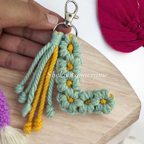 Introducing our stunning Macrame Alphabet Keychain 🤩 Choose your initials or a special word, and carry a piece of art that reflects your personality. Perfect as a gift 🎁 or a stylish accessory for your own keys, bags, or backpacks. Elevate your everyday essentials with this charming, boho-inspired statement piece! [Macrame, keychain, handmade, personalized, bohemian, cotton rope, unique design, artisan, custom, colorful, eco-friendly, fashion accessory, gift idea, knotting, fiber art, styl... Macrame Alphabet, Boho Bag Charm, Alphabet Keychain, Macrame Keychain, Keychain Handmade, Special Words, Bag Charms, Boho Bag, Cotton Rope