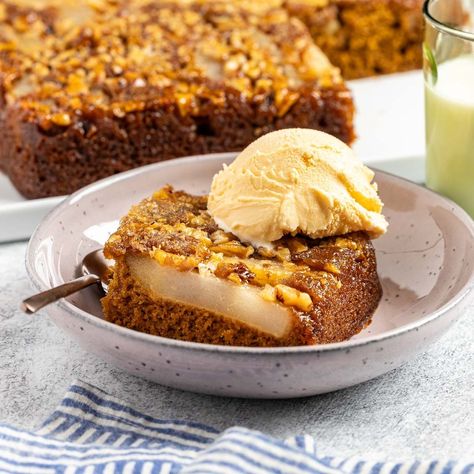 Whether you love to bake or you’re a complete novice, this impressive pear upside-down cake is easy to whip up and serve. It’s sweet and sticky with bites of nutty flavor from toasted walnuts. Pear Upside Down Cake, Ginger Ice Cream, Spiced Pear, Pineapple Upside Down Cake, Pineapple Upside, Pineapple Upside Down, Toasted Walnuts, Upside Down Cake, Food Network