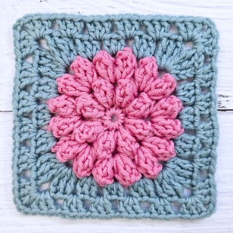 Popcorn Stitch Granny Square Pattern, Flower Squares Crochet, Crochet Popcorn Stitch Granny Square, Crochet Popcorn Stitch Flower, Popcorn Flower Crochet, Crochet Popcorn Flower Granny Square, Crochet Flower Blanket Granny Squares Free Pattern, Crochet Granny Square With Flower, Popcorn Flower Granny Square