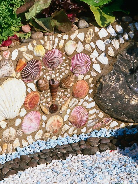 I have a box of shells collected over the years. A mosiac container made of shells would be interesting. Beach Theme Garden, Seashell Creations, Garden Walls, Seashell Projects, Shell Mosaic, Garden Stepping Stones, Patio Wall, Pebble Mosaic, House And Garden