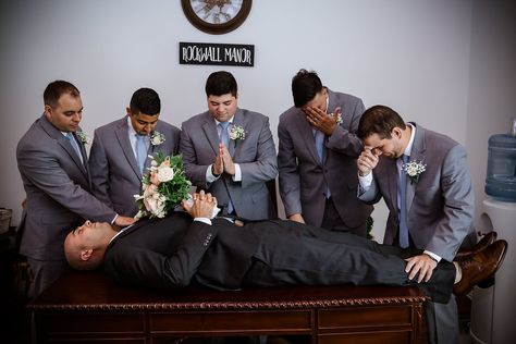 | funny groomsmen photo | "funeral" for the groom ;) | funny wedding day photos | funniest wedding photo ideas | dfw wedding photographer | wedding photo ideas | summer groomsmen style | groomsmen with periwinkle ties + peach boutonnieres | photo taken at THE SPRINGS Event Venue. follow this pin to our website for more information, or to book your free tour! SPRINGS location:  Rockwall Manor in Rockwall, TX photographer:  H|G Photo & Film #groomsmen #funny #weddingphotos #weddingphotography #dfw Funny Wedding Party Pictures, Groomsmen Poses Funny, Funny Groomsman Photos, Groomsmen Funny Photos, Groomsmen Picture Ideas Funny, Creative Groomsmen Photos, Unique Groomsmen Photos, Grooms Pictures Groomsmen Photo Ideas, Groomsmen Photo Ideas Funny