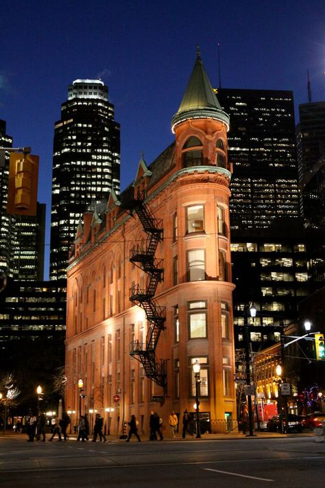 Old town Toronto When we think of modern downtown Toronto, we picture the hustle and bustle of the Eaton Centre, the bright lights of Yonge and Dundas Square, and the tall towers of the financial district. But as little as a century ago, the downtown we know today simply didn’t exist. In the 19th and early 20th centuries, the heart of Toronto stretched from King and Queen Street East, all the way to Parliament and south to the St. Lawrence Market. www.yongeandrich.com Gooderham Building, Lycon Wax, Downtown Buildings, Eaton Centre, Toronto Photography, Old Toronto, Rich Luxury, Toronto City, Flatiron Building