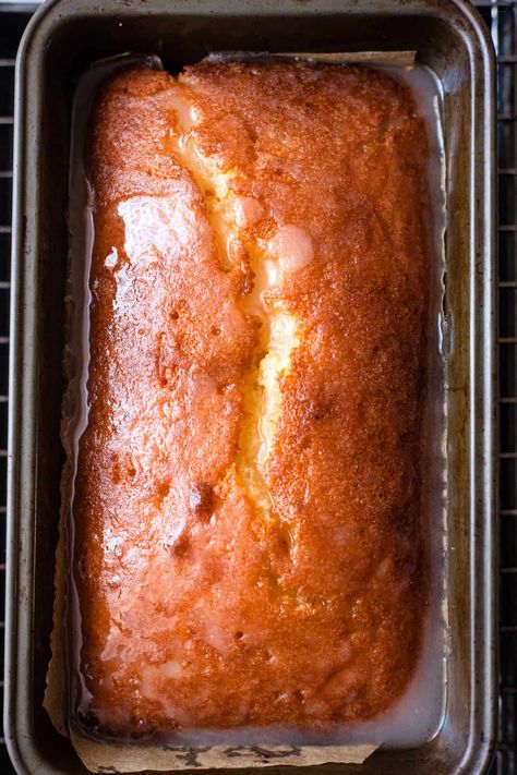 Looking for a foolproof lemon drizzle cake recipe that's packed with flavor? Our easy lemon loaf is a must-try! With its irresistibly moist texture and bright lemony taste, it's a guaranteed crowd-pleaser. Whether you're a novice baker or an experienced pro, this recipe is a breeze to make. Bake it up and enjoy the ultimate combination of sweet, tangy, and downright delicious! Lemon Drizzle Loaf Cake, Lemon Drizzle Loaf, Best Lemon Drizzle Cake, Moist Lemon Loaf, Easy Lemon Loaf, Lemon Drizzle Icing, Easy Lemon Drizzle Cake, Lemon Drizzle Cake Recipe, Classic Pound Cake Recipe