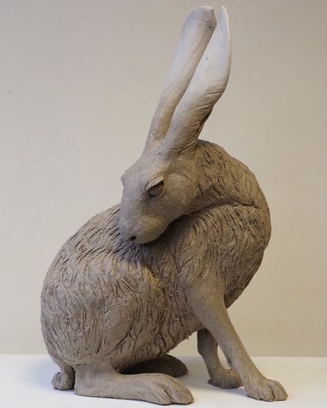 Nick Mackman Animal Sculpture on Instagram: “Hare sculpture finished and waiting for the kiln. With all the hares being frisky right now, it being March and all, I thought I’d capture…” Hare Sculpture Clay, Animal Sculptures Clay, Ceramic Animals Sculpture, Rabbit Reference, Ceramic Throwing, Clay Rabbit, Hare Sculpture, Park Sculpture, Buy Watch