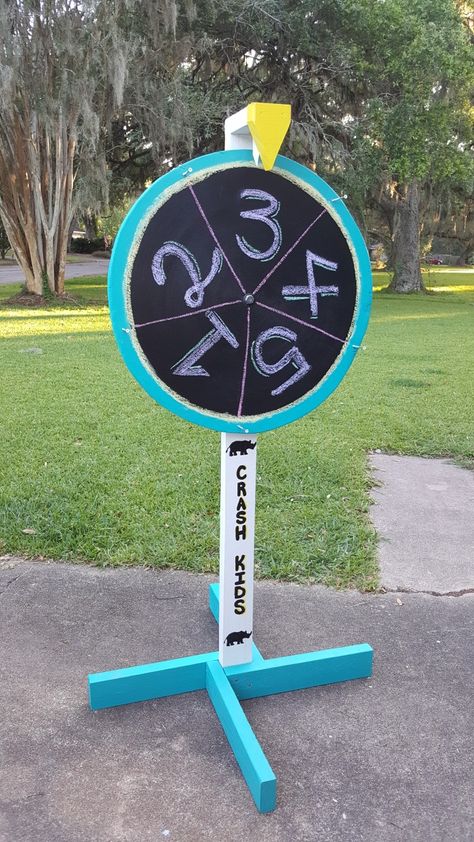 Prize wheel with black chalkboard paint. So you can rewrite for other games. Fortune Wheel Diy, Diy Wheel Of Fortune Spinner, How To Make A Spinning Wheel Game, Spin To Win Wheel Diy, How To Make A Prize Wheel, Diy Prize Wheel, Diy Spinning Prize Wheel, Refurbished Furniture Diy, Spinner Wheel