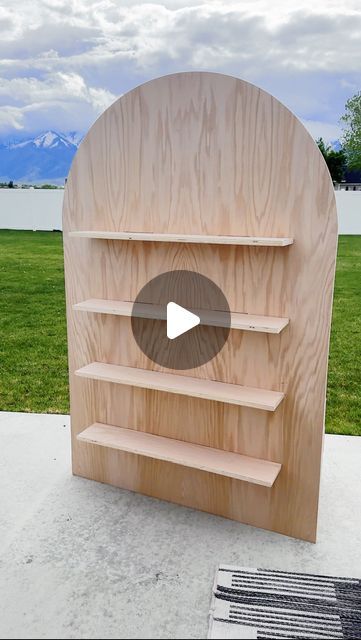 Sadie Eliason on Instagram: "This was such a fun Saturday project! Make sure you’re following for more party projects coming soon! All wood and supplies are from @loweshomeimprovement 💙   #firstbirthdayparty #birthdayparty #woodbackdrop #archbackdrop #floatingshelves #firstbirthdayideas #basketballparty #sportsbirthdayparty" Diy Backdrop With Shelves, Wood Backdrops For Parties, Wooden Party Backdrop, Diy Backdrop Wood, Diy Plywood Backdrop Stand, Wooden Backdrops For Parties, Diy Wooden Backdrop Stand, Wood Party Backdrop, Diy Treat Wall