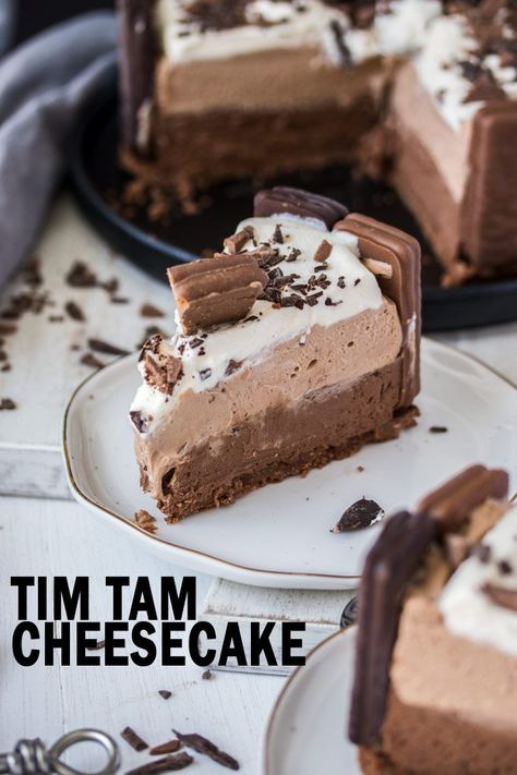 This No Bake Tim Tam Cheesecake is a double chocolate cheesecake inspired by Tim Tams. Layers of milk and dark chocolate cheesecake make this a stunning dessert. #sugarsaltmagic #timtamcheesecake #australiadaydessert #australiadaysweets #australiadayrecipes #timtamrecipes #nobakecheesecake #easycheesecakerecipe #cheesecakerecipe Tim Tam Dessert, Tim Tam Cake, Tim Tam Cheesecake, Cheesecake Slices, Australia Recipes, Double Chocolate Cheesecake, Tim Tams, Dark Chocolate Cheesecake, Paris Bakery