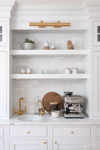 Built In Coffee Bar, Minimalist Kitchen Essentials, Diy Beadboard, Coffee Bar Cart, White Kitchen Inspiration, Coffee Station Kitchen, Modern Kitchen Faucet, Coffee Bar Station, Coffee Bar Ideas