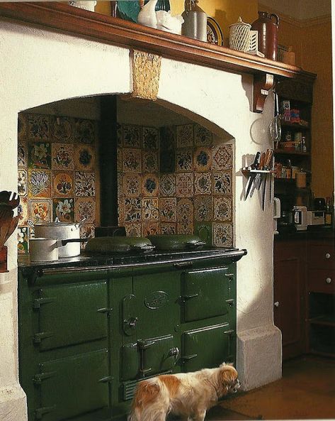 I like how the alcove is lined with all different tiles. I'm beginning to really like alcoves for cooking. Alter Herd, Irish Kitchen, Old Stove, Vintage Stoves, Irish Cottage, English Decor, Cottage Kitchens, Cottage Interiors, Old Kitchen