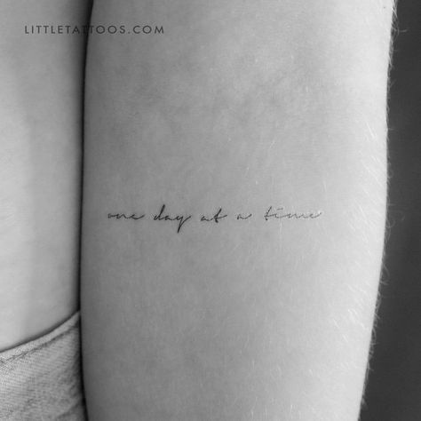 Tomorrow Is Another Day Tattoo, One Day At A Time Tattoo Ideas, One Step At A Time Tattoo, Dainty Quote Tattoos, One Day At A Time Tattoo, Text Tattoo Ideas, Fine Line Tattoo Words, Word Tattoo Ideas, Indian Feather Tattoos