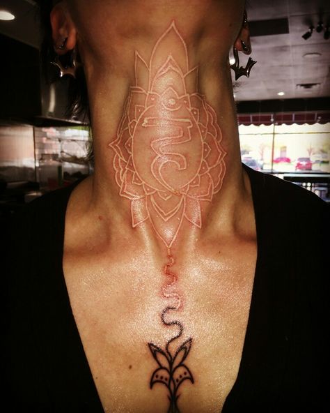 White Ink Throat Tattoo Vishuddha Throat Chakra Vishuddha Chakra Tattoo, Red Throat Tattoo, Chakra Throat Tattoo, Chakra Neck Tattoo, Heart Tattoo On Throat, Vishuddha Tattoo, Throat Chakra Tattoo, Heart Chakra Tattoo, Throat Tattoos