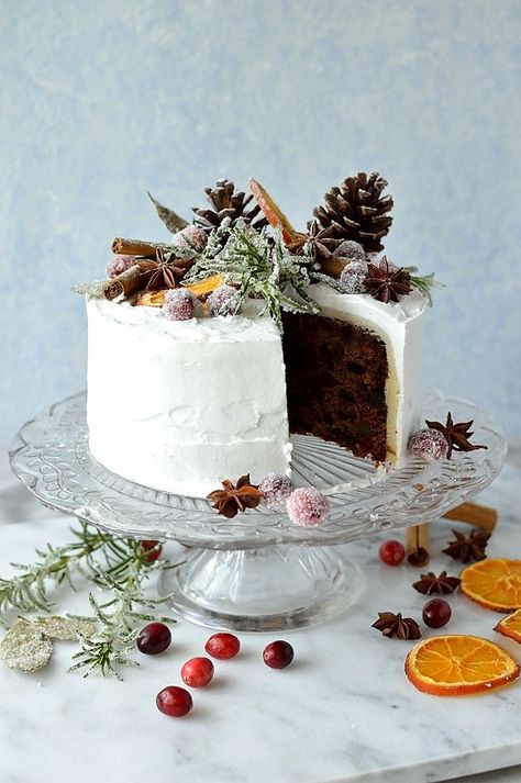 Moist, gingery fruitcake topped with marzipan, royal icing, sugared cranberries, rosemary and bay leaves, dried orange slices, pine cones and whole spices - Domestic Gothess Cake Icing Ideas, Best Fruitcake, Christmas Fruitcake, Rustic Decorations, Icing Ideas, Royal Icing Sugar, Fruit Cake Christmas, Christmas Cake Designs, Sugared Cranberries