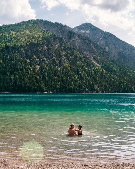 Lake Plansee in Austria after an adventure-filled canyoning experience. Here's everything you need to know about going on a canyoning tour from Garmisch-Partenkirchen in Germany to Plansee in Tyrol, Austria. Get ready for adrenaline and fun down a steep mountain river! #canyoning #adventure #travel #germany #austria #europe Plansee Austria, Steep Mountain, Austria Travel Guide, Germany Travel Guide, Tyrol Austria, Garmisch Partenkirchen, Travel Germany, Neuschwanstein Castle, Austria Travel