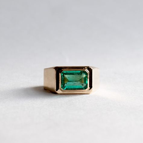 An emerald cut Colombian emerald bezel set in timeless solid 18K yellow gold. Metal: 18k Yellow Gold Stone: Natural Colombian Emerald Stone Weight: 2 Carat Band width: 10mm Stone Gold Rings For Men, Emerald Ring Design For Men, Emerald Ring For Men, Emerald Ring Design, Stone Rings For Men, Colombian Emerald Ring, Mens Ring Designs, Emerald Ring Vintage, Clothing Aesthetic