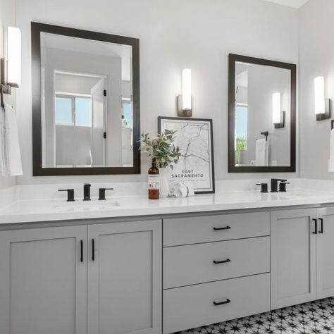 HGTV presents a transitional gray bathroom with the perfect vanity lights that oversee two beautiful sleek chocolate brown rectangle mirrors. Double Vanity Bathroom Remodel, Master Bath Mirror, Light Grey Bathrooms, Grey Bathroom Cabinets, Master Bath Vanity, Grey Bathroom Vanity, Gray Bathroom, Bathroom Redesign, Master Bath Remodel