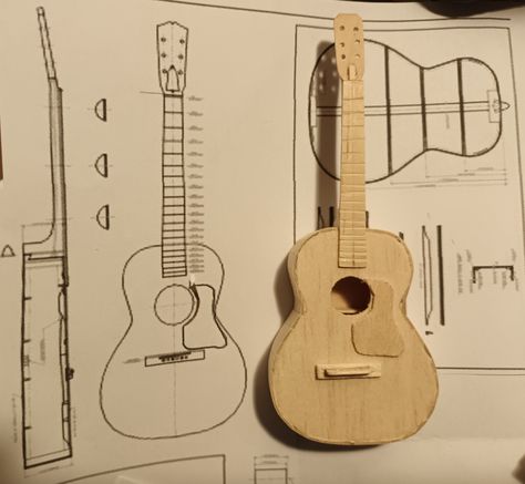 Miniature Guitar Diy, Guitar Wood, Pencil Carving, Guitar Crafts, Marvel Room, Soda Can Crafts, Music Notes Art, Miniature Guitars, Cardboard Crafts Diy