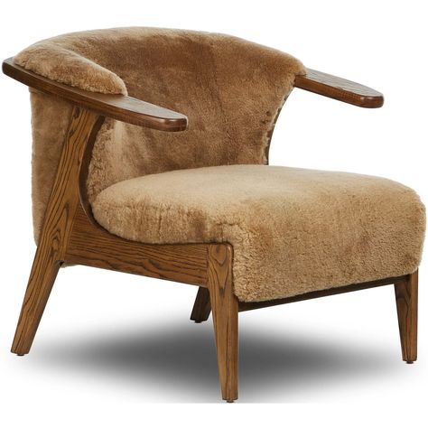 Available online only. Ships directly from the vendor. The Fabian Chair features subtle paddle arms and a wrap frame of amber-finished ash, embracing soft brown shearling for a luxurious touch. Its S-spring construction ensures exceptional comfort, making it both stylish and supportive. This chair combines elegant design with practical comfort, perfect for adding a sophisticated and cozy element to any room. Bean Bag Lounge Chair, Leather Bean Bag, Rattan Daybed, Boutique Inspiration, Dining Room Cozy, Apartment Decor Inspiration, High Fashion Home, Four Hands, Soft Brown