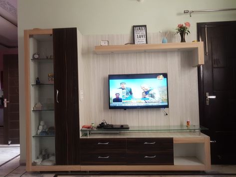 #Tv unit #L shape #glassshelves #ground clarance L Shape Tv Unit Design Modern, One Side Tv Unit Design, L Shape Tv Unit Design, Ikea Glass Shelves, Shelves In Bathroom, Ikea Glass, Diy Shelf Decor, Kitchen Shelf Brackets, Burgundy Living Room