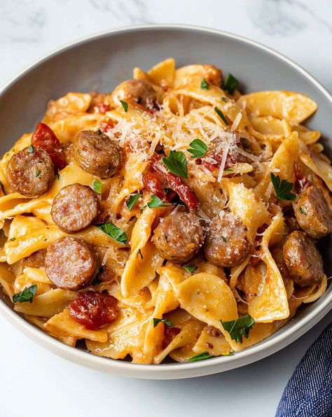 One-Pot Spicy Sausage Pasta - Recipessin Hot Sausage Pasta Recipes, One Pot Spicy Sausage Pasta, Sweet Sausage Pasta Recipes, Dinner With Sausage Links, Vodka Sausage Pasta, Spicy Sausage Pasta Recipes, Salsiccia Recipes, Andoulli Sausage Recipe, Italian Sausage Link Recipes