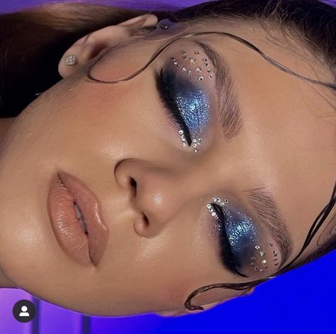 Blue Diamond Eye Makeup, Blue Jewel Makeup, Light Blue Eyeshadow With Rhinestones, Rhinestone Blue Makeup, Blue Eyeshadow Rhinestones, Prom Makeup Blue And Silver, Prom Gem Makeup, Dark Blue Sparkly Makeup, Sapphire Eye Makeup