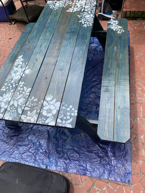 Worn navy stain and stenciled flowers Painted Picnic Table, Painted Picnic Tables, Picnic Table Makeover, Diy Picnic Table, Wooden Picnic Tables, Deck Table, Convertible Furniture, Picnic Bench, Picnic Tables