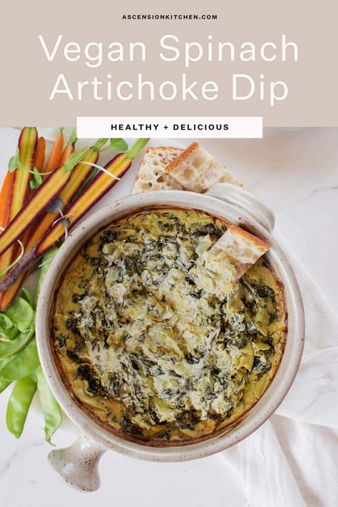 Creamy vegan Spinach Artichoke Dip – this healthy, Nutritionist-approved recipe is made with whole foods – 10 ingredients, 30 mins to make, the best hot dip for a cozy night in! #artichokerecipes #spinachdip #vegandip Vegan Spinach Dip, Baked Spinach Artichoke Dip, Vegan Spinach Artichoke Dip, Baked Spinach, Spinach Artichoke Dip Recipe, Vegan Spinach, Artichoke Dip Recipe, Vegan Baked, Vegan Dip