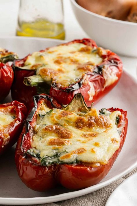 Ricotta Stuffed Peppers, Best Stuffed Peppers, Stuffed Red Peppers, Spinach Filling, Cheesy Spinach, Spinach And Ricotta, Creamy Spinach, Melty Cheese, Veggie Side Dishes