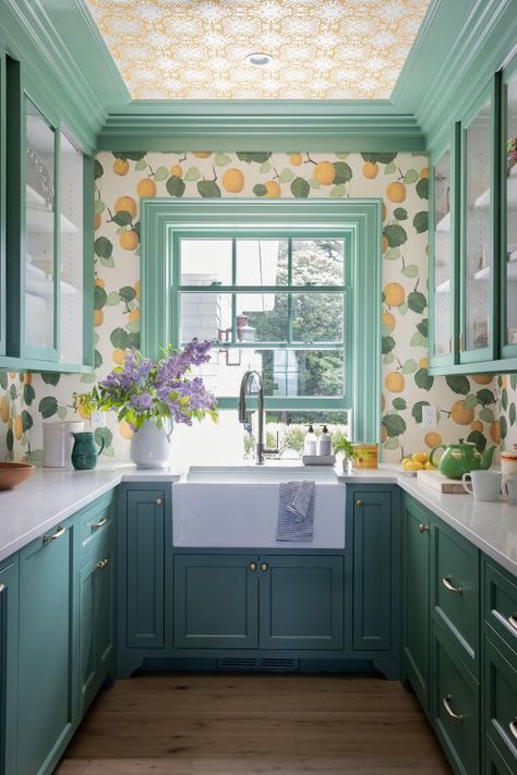 This bright pantry is packed full of personality and features lemon patterned wallpaper, seafoam green cabinets and trim, and gold wallpaper on the ceiling. Cape Cod Kitchen, Colored Cabinets, Vibrant Kitchen, Classic White Kitchen, Shingle Style Homes, Lemon Kitchen, Seaside Style, Cape Cod House, Colors And Patterns