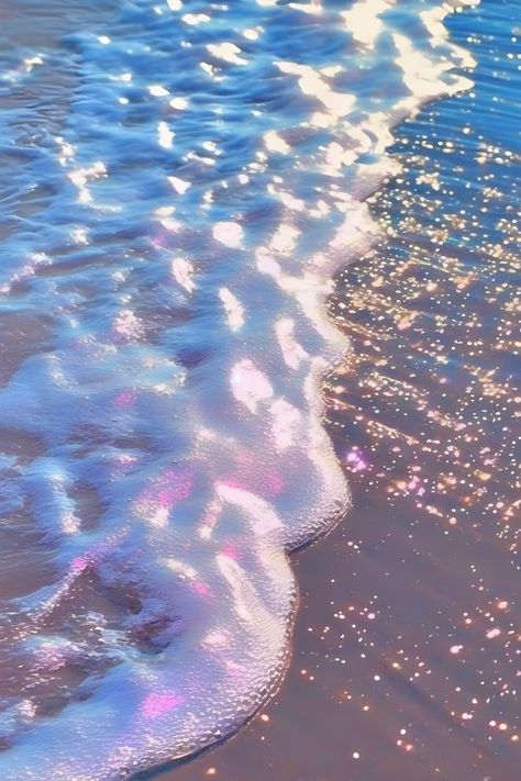 an artistic photo that is a close up of ocean waves. pink sparkles and glitter can be seen in the waves and sand. this is vaporware and mermaid core aesthetics Mermaidcore Aesthetic, Mermaid Cove, Water Aesthetic, Mermaid Aesthetic, Mermaid Dreams, Mermaid Life, Pretty Landscapes, Beach Paradise, Pretty Wallpaper Iphone