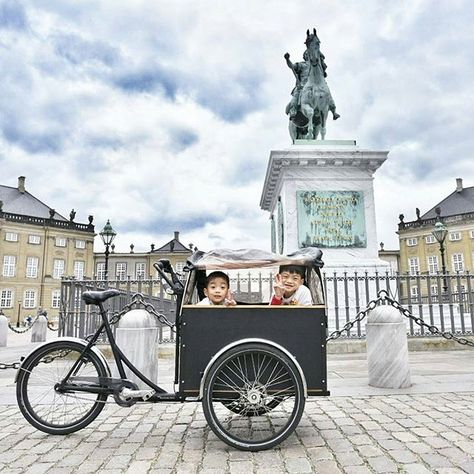 "Once they saw the Christiania bike, they immediately cheered up" #together By @bumble_bee_mum "It was not just a novelty to them, it was extremely practical! The kids could eat & sleep inside, and it kept them sheltered from the cold wind and rain. So our initially crappy day in rainy Copenhagen turned into an awesome day thanks to this Christiania bike." Christiania Bike, Crappy Day, Industrial Estate, Uk London, Cargo Bike, Wind And Rain, North South, Christchurch, Cheer Up