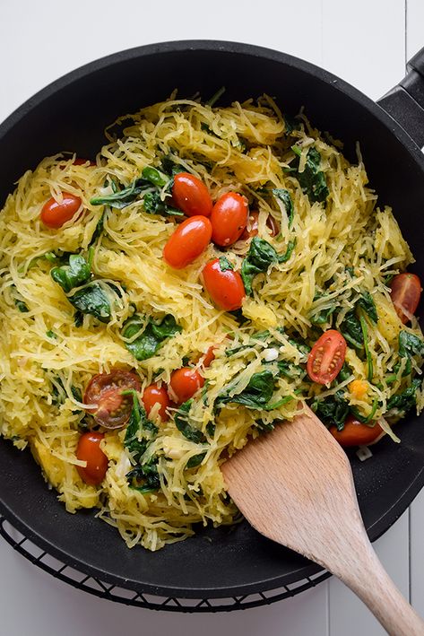 Spaghetti Squash loaded with spinach, tomatoes, and a generous amount of roasted garlic. Only 5 ingredients, low-carb, and delicious. Vegetarian Recipes Spaghetti Squash, Spaghetti Squash And Tomatoes, Dinner Ideas Spaghetti Squash, Spaghetti Squash And Spinach, Spaghetti Squash And Tomato Recipes, Frozen Spaghetti Squash Recipes, Spaghetti Squash And Spinach Recipes, Spaghetti Squash Recipes With Tomatoes, Spaghetti Squash Noodles Recipes