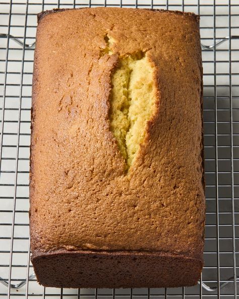 overhead shot of a pound cake loaf, on a cooling rack. Cake Loaf, Sour Cream Pound Cake, Dairy Desserts, School Cake, Lemon Bread, Cream Cheese Pound Cake, Pistachio Cake, Loaf Cake, Pound Cake Recipes