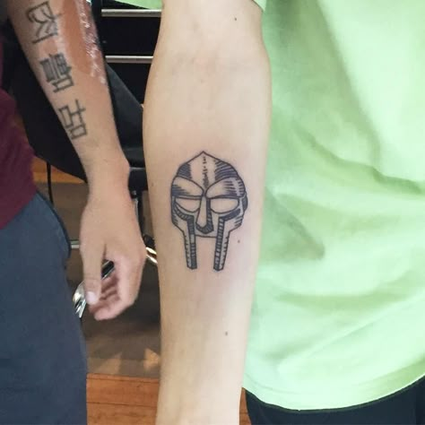 Doom Tattoo Design, Kanye Tattoo, Doom Tattoo, Ogham Tattoo, Hip Hop Tattoo, New Tattoo Styles, Doom Mask, Mf Doom Mask, Adam Rose