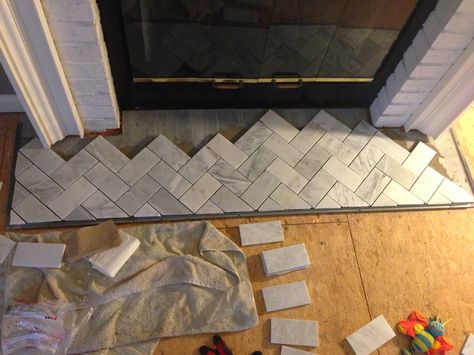 Chic meets Healthy: FIREPLACE HEARTH PT. 1 - HERRINGBONE MARBLE TILE HEARTH Tile Hearth, Marble Herringbone Floor, Fireplace Hearth Tiles, Hearth Tiles, Fireplace Diy, Fireplace Redo, Fake Fireplace, Metal Fireplace, Basement Bedroom