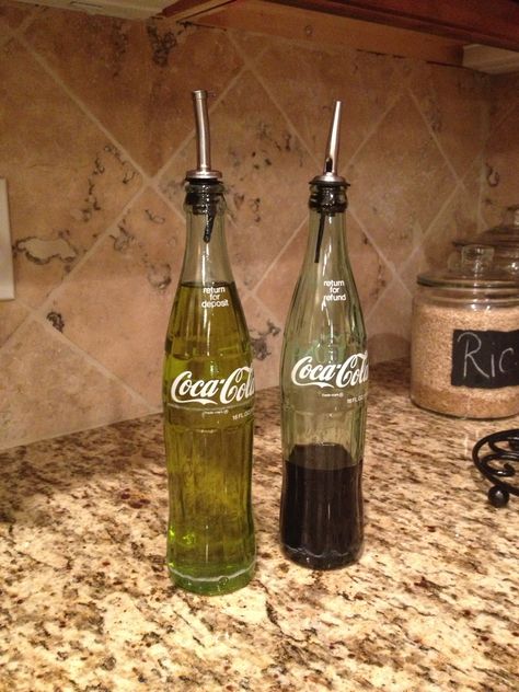 Antique coke bottles used for oil and vinegar dispensers, great idea mom! Bottle Repurpose Ideas, Glass Soda Bottle Crafts, Glass Coke Bottle Crafts, Coke Bottle Decor, Coke Bottle Crafts, Soda Bottle Crafts, Oil And Vinegar Dispensers, Coca Cola Decor, Bottle Ideas