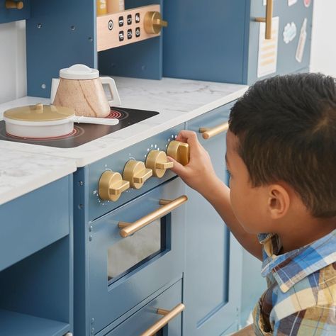 INCLUDED: This complete kids kitchen playset includes 2 spatulas, a pot, pan, lid, 2 seasoning bottles, 4 cuttable eggs in a carton, a cup, 3 ice cubes, a coffee pot, & a sheet of refrigerator magnets. INTERACTIVE FEATURES: With a magnetic fridge door and oven knobs that realistically click when turned, this kids kitchen playset is a must-have for the #Children's #game #kids Childrens Play Kitchen, Kitchen Stone, Kitchen Playset, Kid Chef, Pretend Kitchen, Wooden Play Kitchen, Kids Play Kitchen, Play Kitchen Sets, Gold Color Scheme